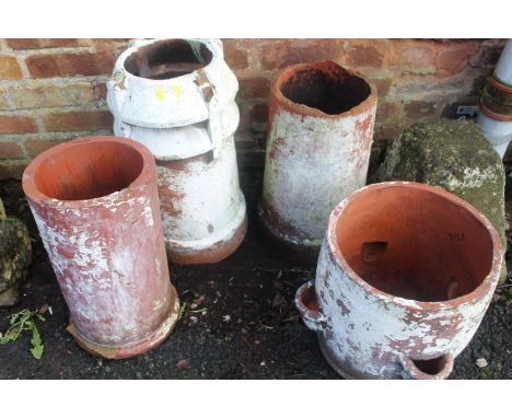 FOUR TERRACOTTA PLANTERS TO INCLUDE THREE CHIMNEY POTS AND A STRAWBERRY PLANTER