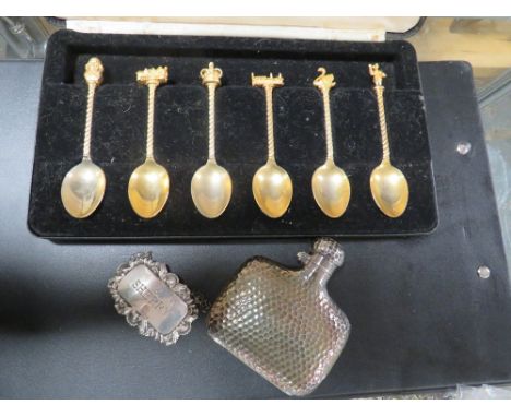 A SET OF SHAKESPEARE SOUVENIR SPOONS, SILVER WINE LABEL AND SILVER PLATED SPRIT FLASK