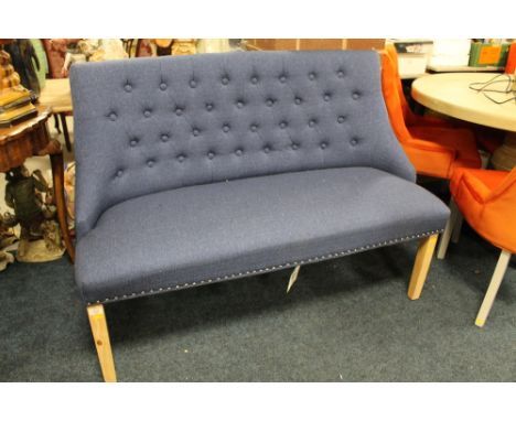 A MODERN BLUE UPHOLSTERED BENCH SETTEE - W 134 CM