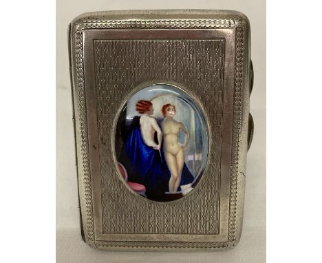 A hallmarked silver cigarette case with engine turned detail &amp; ceramic oval plaque depicting a nude. Fully hallmarked to 