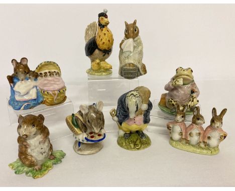 8 Beatrix Potter ceramic figures by Beswick. Comprising: Appley Dapply, Chippy Hackee, Timmy Willie, Hunca Munca, Tommy Brock