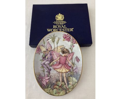 A boxed Royal Worcester ceramic Flower fairy oval plaque. Depicting The Columbine Fairy, from Cecily Mary Barker to commemora