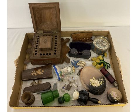 A box of mixed vintage items to include a carved wood cigarette box with matching match box case. Also included are: vintage 