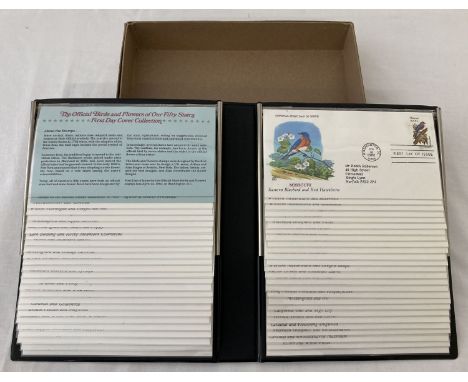 A boxed commemorative album of American first day covers from Postal Commemorative Society. Containing 50 first day covers en