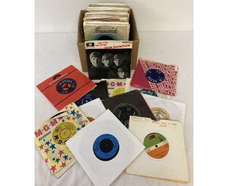 A collection of 89 vintage single records. Artists include: The Beatles, The Rolling Stones, Freddie &amp; The Dreamers, Nanc
