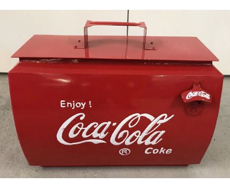 A vintage style painted metal Coca Cola cooler with lift off lid and bottle opener on front.  Approx. 36cm tall x 45cm wide.