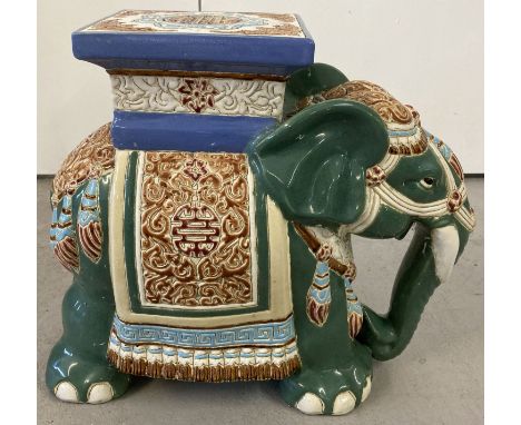 A ceramic jardinière/stool in the shape of an Asian elephant.  Approx. 42 cm tall.