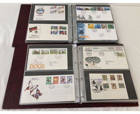 2 albums of First Day Covers. An album of British covers dating from the 1970's. Together with an album of foreign covers. To