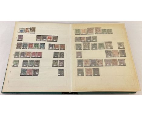 A vintage stamp stock book containing antique and vintage world stamps. To include Victorian and Edwardian India stamps. 