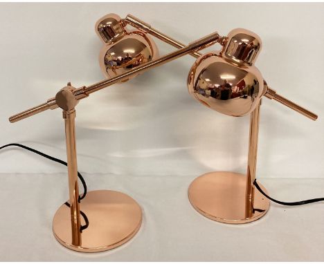 A pair of new copper angle poise style desk lamp.  Shade approx. 10cm diameter.