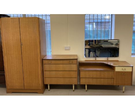 A retro 1960's style light wood bedroom suite by Avalon Yatton. Comprising: Double wardrobe with hanging rail shelves and col