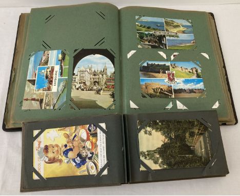 2 vintage postcard albums containing a quantity of assorted vintage cards. To include: Coastal scenes, comical, RP's and gree