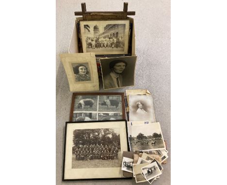A box of framed and glazed and loose vintage photographs of family portraits, military and animals. To include Edwardian. 