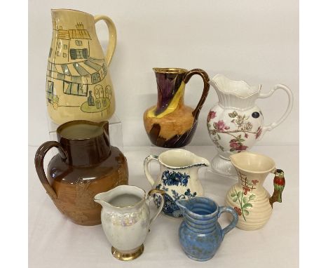 A collection of assorted vintage ceramic jugs. To include: Mason's, Aynsley, Doulton Lambeth Harvester jug and Shorter. 