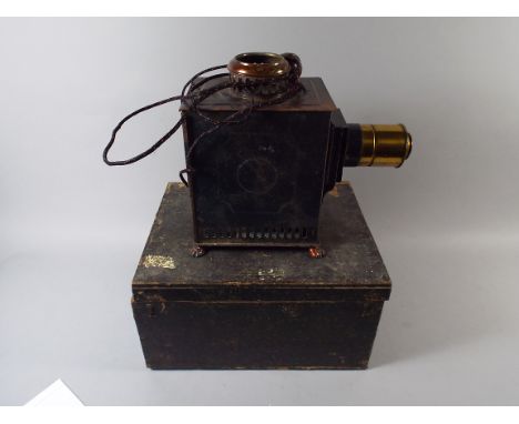 A Late Victorian Tin Plate Magic Lantern in Original Wooden Box.