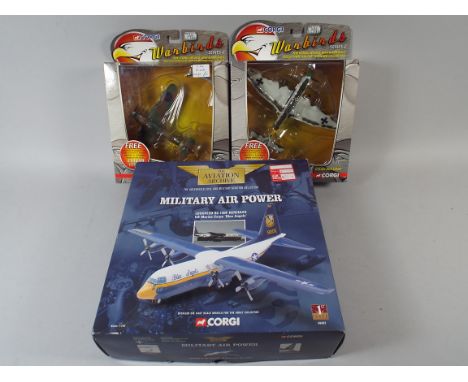 A Collection of Three Die Cast Corgi Airplanes Including Hercules and Two War Birds. 