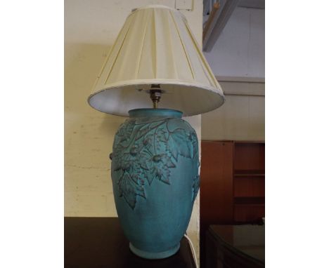 A Ceramic Table Lamp with Moulded Leaf Decoration in Relief.