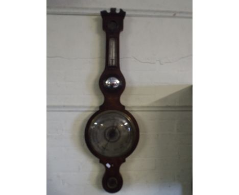 A 19th Century Mahogany Wheel Barometer with Temperature Scale.