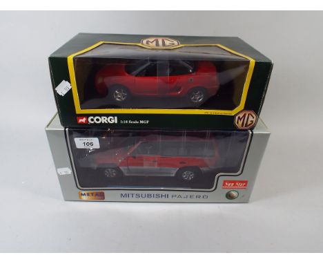 A Boxed Corgi MGF and a Sun Star Pajero.