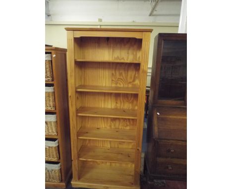 A Pine Six Shelf Open Bookcase.