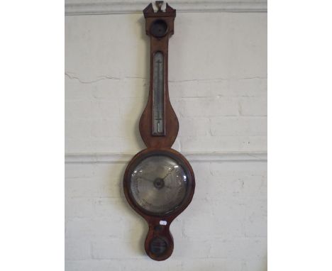 A 19th Century Wheel Barometer in Need of Restoration.