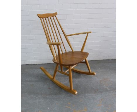 Ercol blonde elm rocking chair, 86 x 62 x 41cm. 