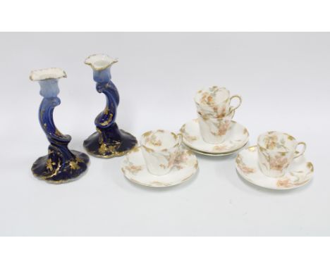 Limoges porcelain cups and saucers and a pair of blue glazed candlesticks (a lot) 