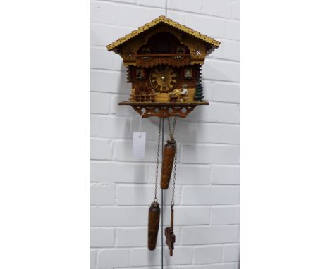 Cuckoo style wall clock, 28 x 26cm. 