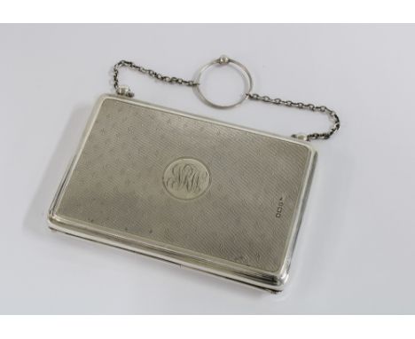 George V silver purse / aide memoire, Sheffield 1915, engine turned decoration and green leather interior, 10cm wide 