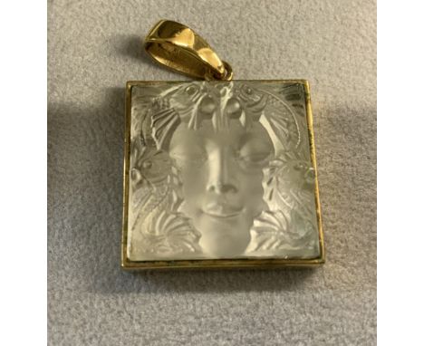 LALIQUE "MASQUE DE FEMME" CRYSTAL PENDANT & EARRINGS Mid-20th Century Raised woman's face surrounded by Ocean Life, mounted o
