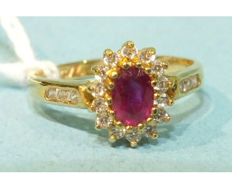 A ruby and cz cluster ring with 9ct gold mount, size L, 2g.