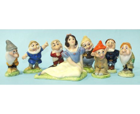 A set of Wade Snow White and the Seven Dwarves, (1 a/f), three other ceramic figures and a plastic c/w horse.