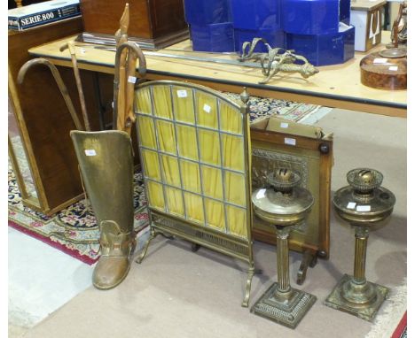 A leaded light and brass fire screen, a boot stick stand, two oil lamps and other items.