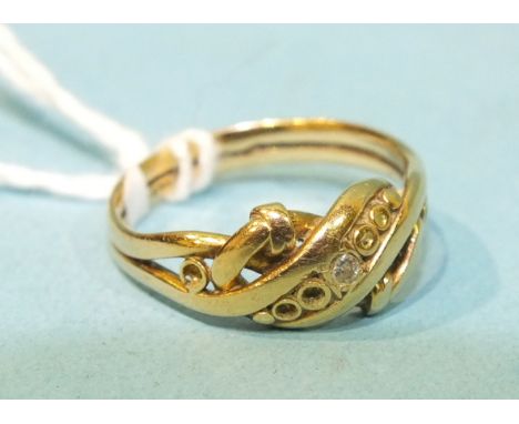 An 18ct gold ring set a single diamond, size L½, 3.6g.