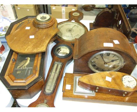 An oak clock bracket, an American wall clock case, the door painted with an eagle, an oak mantel clock and other items.