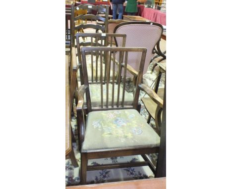A set of six 19th century mahogany dining chairs with drop-in seats, includes two carvers and an oak ladder-back carver chair