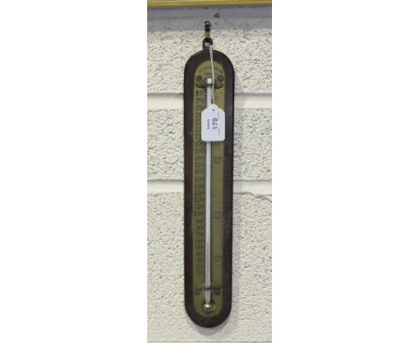 A brass and mahogany thermometer by A C Cossor & Son, London, 39cm high.
