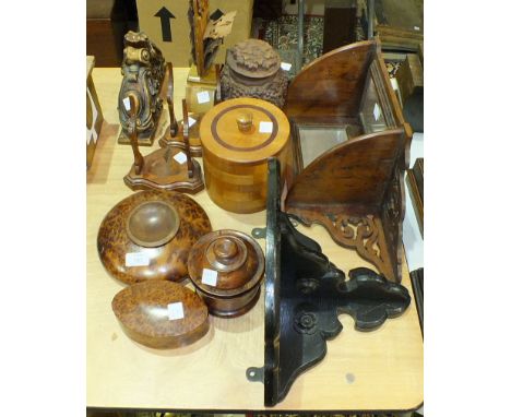 A stained oak clock bracket, a hardwood mirrored corner shelf and other wooden items.