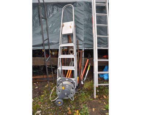 A COLLECTION OF GARDEN TOOLS AND A CLIMA STEP LADDER length 188cm, forks, spades, shears etc