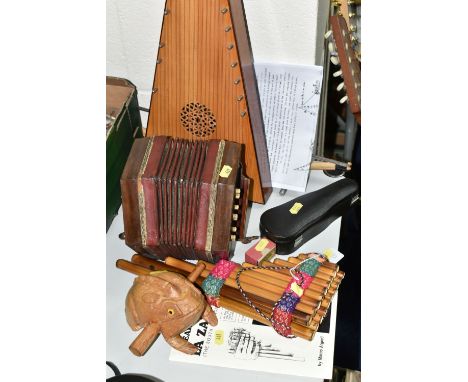 A GROUP OF MUSICAL INSTRUMENTS, comprising an 'Aiden Edwards' Celtic Psaltery harp and bow, paper maker's label inside made i