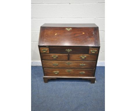 A GEORGIAN MAHOGANY BUREAU, the fall front door enclosing a fitted interior, above six drawers, on bracket feet, width 91cm x