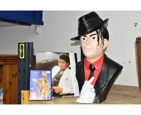 A MICHAEL JACKSON BUST, THRILLER LP AND DVD, the hollow resin bust of the singer wearing his iconic single white glove, heigh