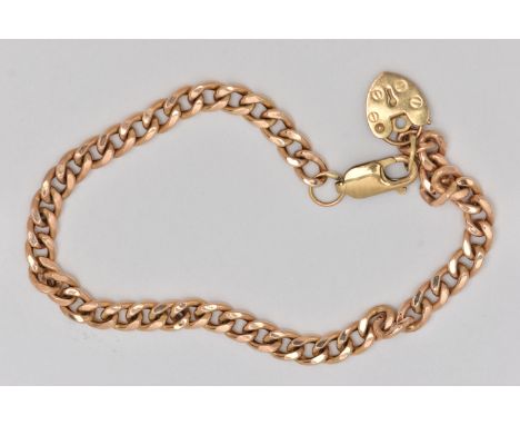 A 9CT GOLD CHAIN BRACELET, the curb link bracelet with spring release clasp, suspending a heart padlock clasp, bracelet with 