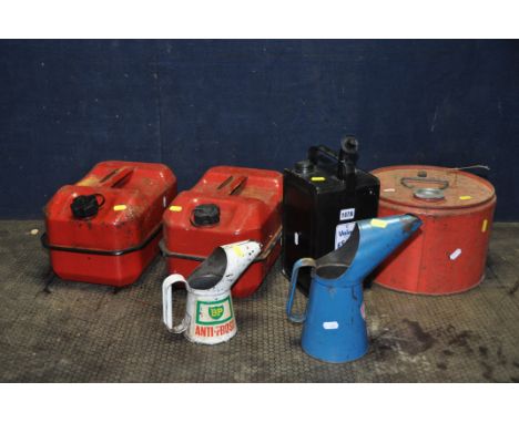 TEN VINTAGE FUEL AND OIL CANS including a Fina and a BP oil cans, two petrol cans, a Valor Paraffin can and a round can 11in 