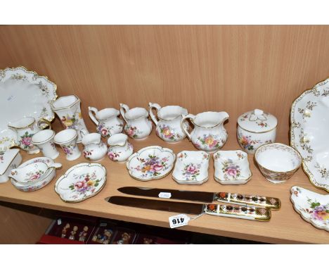 A COLLECTION OF ROYAL CROWN DERBY TEA WARES, comprising two Imari bread knives, for sale to OVER 18s ONLY (one with broken ha