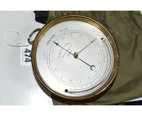A NEGRETTI &amp; ZAMBRA BRASS CASED CIRCULAR BAROMETER, the silvered dial marked with 'RAIN CHANGE FAIR', thermometer and add