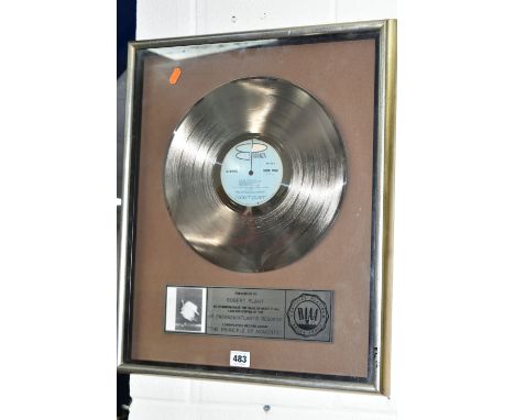 A FRAMED PLATINUM DISC AWARDED TO ROBERT PLANT FOR THE 'PRINCIPLE OF MOMENTS' LONG PLAYING ALBUM, presented to Robert Plant t