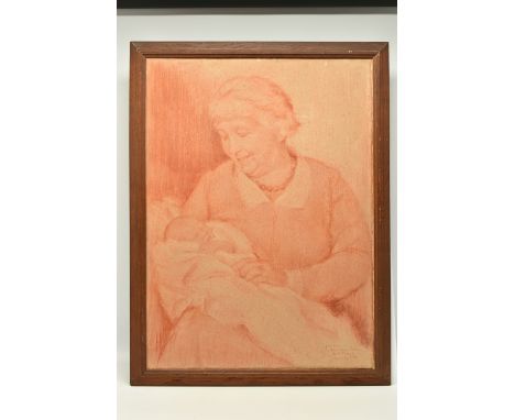 A EARLY 20TH CENTURY PORTRAIT OF A GRANDMOTHER HOLDING A BABY, the seated portrait depicts the smiling grandmother gazing at 