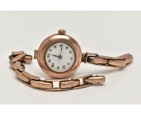 A LADYS 9CT GOLD WRISTWATCH, manual wind, round white dial, Arabic numerals, blue steel hands, in a polished case, inside cas