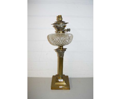 OIL LAMP WITH FROSTED GLASS SHADE, CLEAR GLASS FONT AND A BRASS CORINTHIAN COLUMN BASE